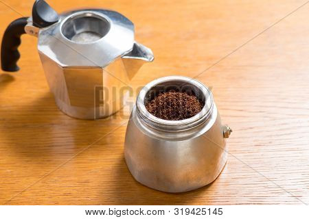 Moka Pot And Coffee Beans And Grinder.