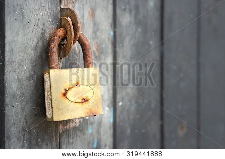 The Rusty Lock With Wood Door, Old Lock Close Home Door.