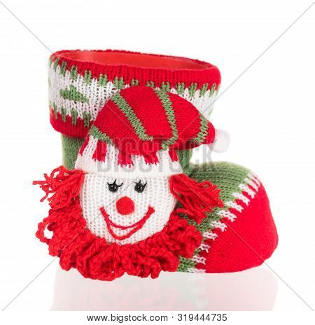 Bright Knitting Shoe With Elf Heaf For Christmas Eve Isolated Over White Background