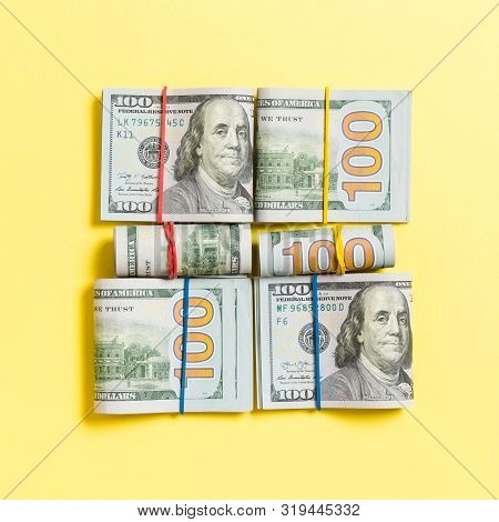 Us Dollar Bills Bundles Stack. One Hundred Dollar Bills With Stack Of Money In The Middle. Top View 