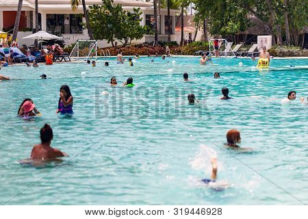 Dominican Republic, Bayaibe, Catalonia Gran Dominicus Hotel - 09 June 2019: People Swimming In Pool 