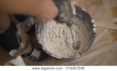 The Solution Is Mixed With A Construction Mixer. Mix The Solution In A Bucket. Manual Mixing Of Ceme