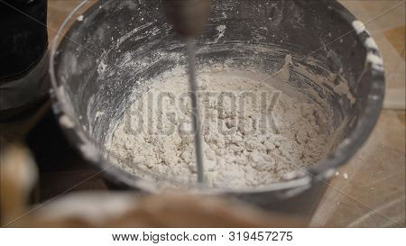 The Solution Is Mixed With A Construction Mixer. Mix The Solution In A Bucket. Manual Mixing Of Ceme
