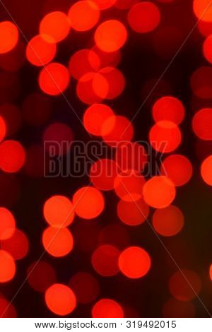 Red Christmas Bokeh With Light Beautifully Little Lights. Blurred Background. Place For Your Text, M