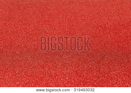 Shiny Glitter Red Bachground Texture. Glittering Red Paper