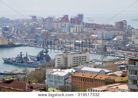 Vladivostok, Russia - April 28, 2019: City Skyline, Golden Horn Bay, Commercial Vessels And Russian 