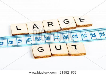 Health Concept Of A Tape Measure Also Showing The Message Large Gut