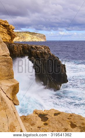 Huge Waves Crash On Cloudy Day. Kemmuna Island