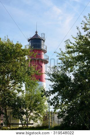 Lighthouse In The City Of Buesum, Famous Tourist Resort On The North Sea Coast In Germany