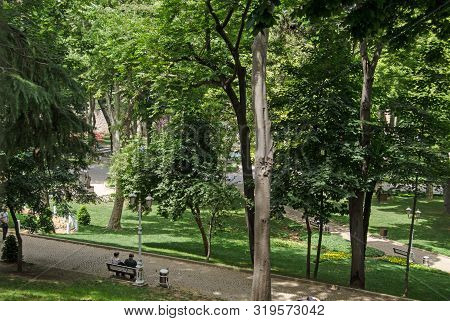 Istanbul, Turkey - June 6, 2016:  Visitors And Local Residents Enjoying The Shade Of Gulhane Park In