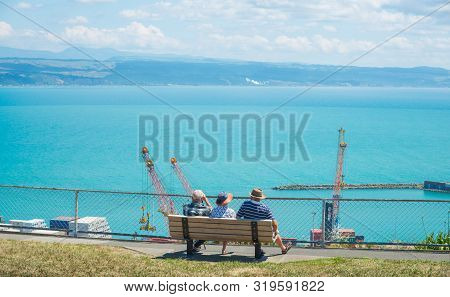 New Zealander Trio Elder Sitting And Relaxing To See The Beautiful View Of Port Of Napier From Bluff