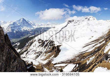 Snow On Alps Mountain At Switzerland , Looking From Sky Cliff Walk On First Peak Grindelwald