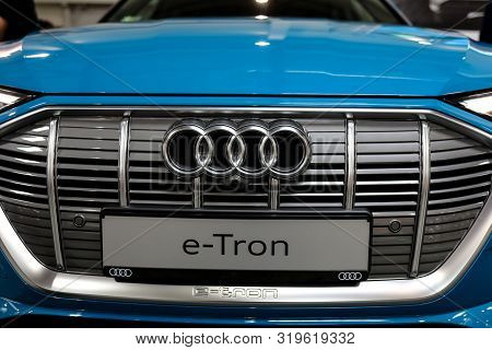Cracow, Poland - May 18, 2019: Audi E-tron Metalic Logo Closeup On The Car Displayed At Moto Show In