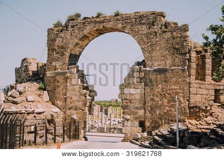 Ancient Turkish City. Side, Turkey. Remnants Of The Past. Antique Arch.active Holidays In Warm Count