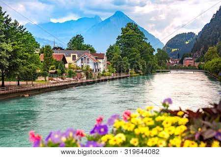Aare River In Old City Of Interlaken, Important Tourist Center In The Bernese Highlands, Switzerland