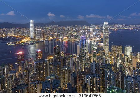Victoria Harbor Of Hong Kong City At Dusk