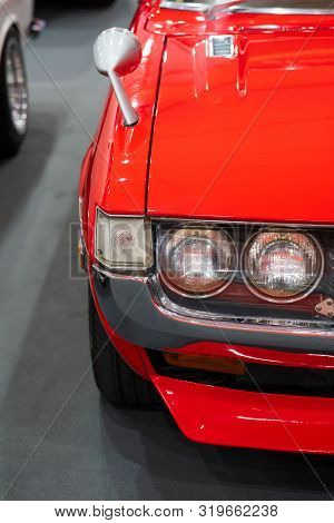 Close Up Color Detail On The Headlight Of A Vintage Car