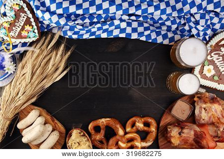 Traditional German Cuisine, Schweinshaxe Roasted Ham Hock. Beer, Pretzels And Various Bavarian Speci