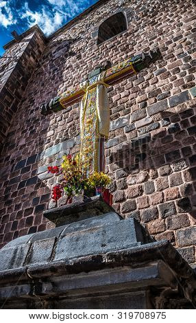 Cusco, Peru - 05/24/2019: Cross Outside Of Qoricancha And Santo Domingo In Cusco, Peru.