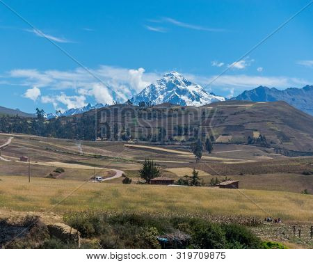 Sacred Valley, Peru - 05/21/2019: The Inescapable Snow Peaked Andes Mountains In The Sacred Valley O