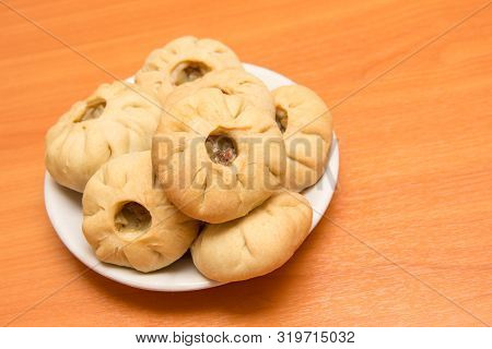 Vak Belyash - Bashkir National Cuisine, Homemade Meat Pies In White Bowl Over Wooden Background