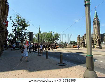 July 7, 2012, Ottawa, Canada, Irish Bag Pipers Marching Band, Marching Down Wellington Street With T