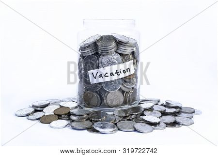 Saving Idr Coins In The Glass Bottle Jar For Vacation