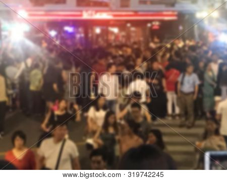 Blurred Chinese Tourists Crowd At Thai Famous Night Train Market Place.