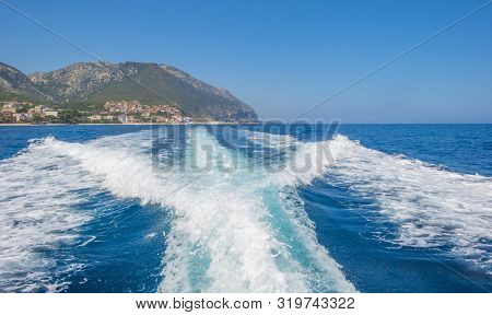 Rocky Coast Of The Island Of Sardinia In The Mediterranean Sea Viewed From A Boat