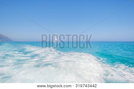 Rocky Coast Of The Island Of Sardinia In The Mediterranean Sea Viewed From A Boat