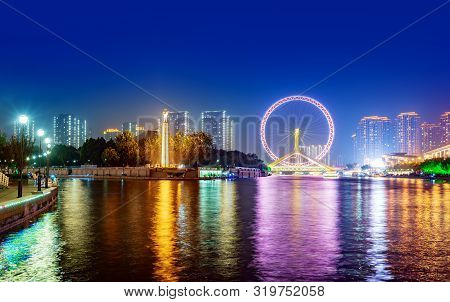 Night Scene Cityscape Of Tianjin Ferris Wheel,tianjin Eyes In Twilight Time.most Modern And Popular 