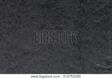 Strict Synthetic Stone Background In Dark Grey Tone.