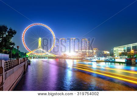 Night Scene Cityscape Of Tianjin Ferris Wheel,tianjin Eyes In Twilight Time.most Modern And Popular 