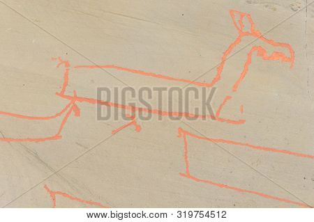 Rock Art In Alta Fjord, Norway. Ancient Symbols, Real Drawing,  Texture In Stone. Red Ocher Paint. H
