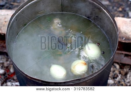 Cooking Broth From Fish. Cooking Fish Soup In A Forest. Fishing Soup.
