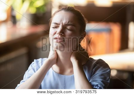 Tired Young Woman Feel Neck Pain Rubbing Stiff Neck
