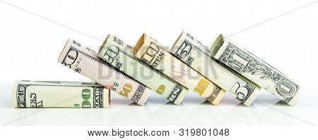 Recession Concept, Fallen Blocks Of American Dollar Denominations In One Row On White Background