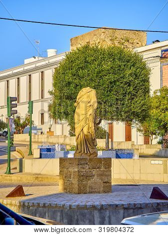 Tarifa, Spain - June 27, 2019. Roman Statue In Tarifa Downtown. Cadiz Province, Andalusia, Spain.