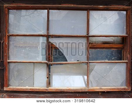 Old Broken Windows. Wooden Frames. Dirty And Broken Glass. Abandoned House.