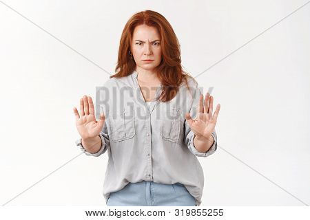 Stop Right There. Serious-looking Mad Middle-aged Redhead Mother Caught Son Smoking Forbid Raise Han
