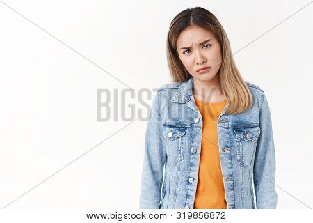 Frustrated Doubtful Young Intense Asian Blond Girl Frowning Cringe Hesitant Squinting Suspicious Hav