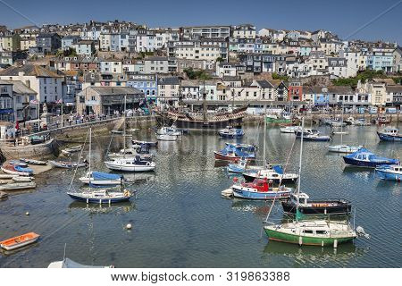 23 May 2018: Brixham, Devon, Uk - The Harbour With The Replica Golden Hind On A Fine Spring Day With