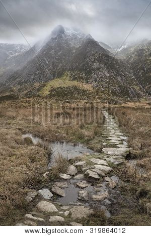 Beautiful Winter Landscape Image Looking Along Valley From Crimpiau Towards Mountains In The Distanc