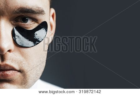 Banner - Man Face With Flakes Under The Eyes. Mans Flakes. Patches Under Close Eyes For Man. Close U