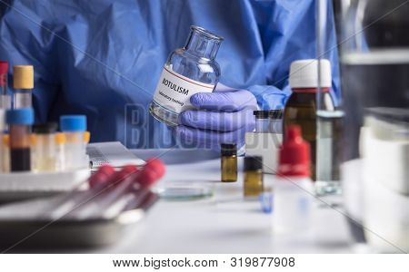Specialist Analyzes Botulism Samples In Laboratory, Conceptual Image
