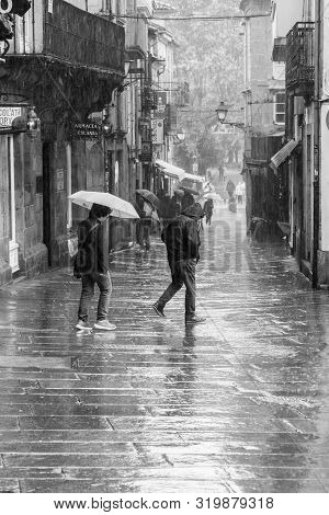 Santiago De Compostela, Spain; August 9, 2019: Stret Of A Old Town Of Santiago De Compostela On Rain
