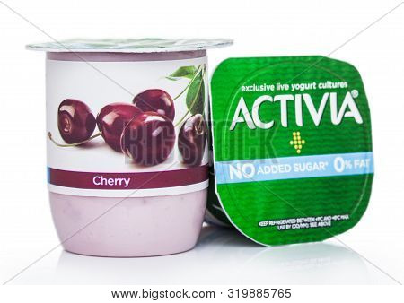 London, Uk - August 18, 2019: Cup Of Activia Exclusive Live Yogurt Cultures With Cherries On White B