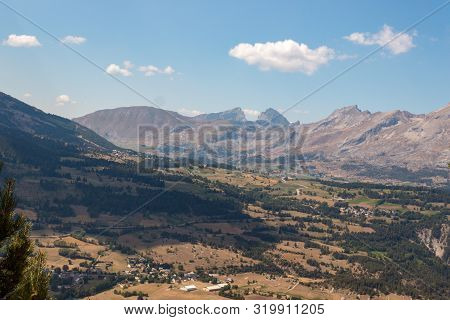 Scenic View Of The Devoluy Mountains On A Warm Summer's Day
