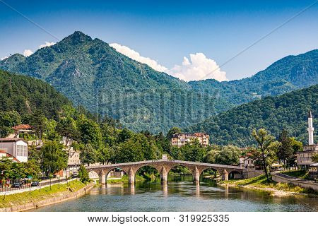 Konjic, Bosnia And Herzegovina - July 18, 2019. Old Stone Bridge Above River Neretva
