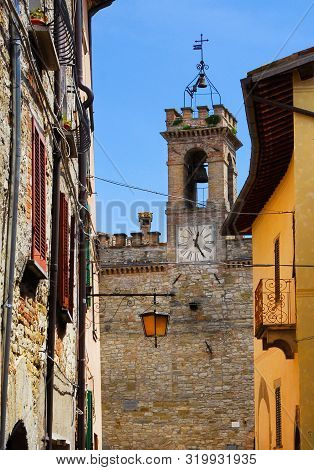 View Of The Old Clocktower, Erected In The 17th Century, From A Narrow Lane In Pietralunga Historic 